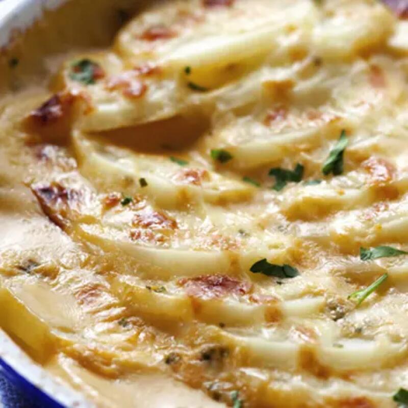 Recette : Gratin de pommes de terre au fromage à raclette