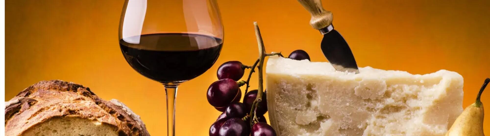 LA02_appetizing-meal-with-cheese-and-fruit-and-wine-picture-id1053963660