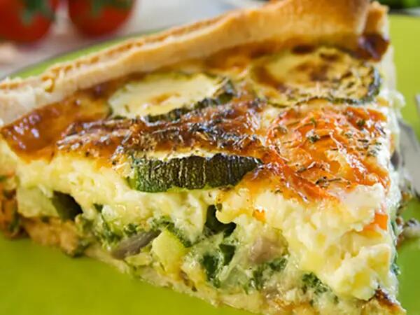 Recettes : Tarte légère aux courgettes à la crème de bleu