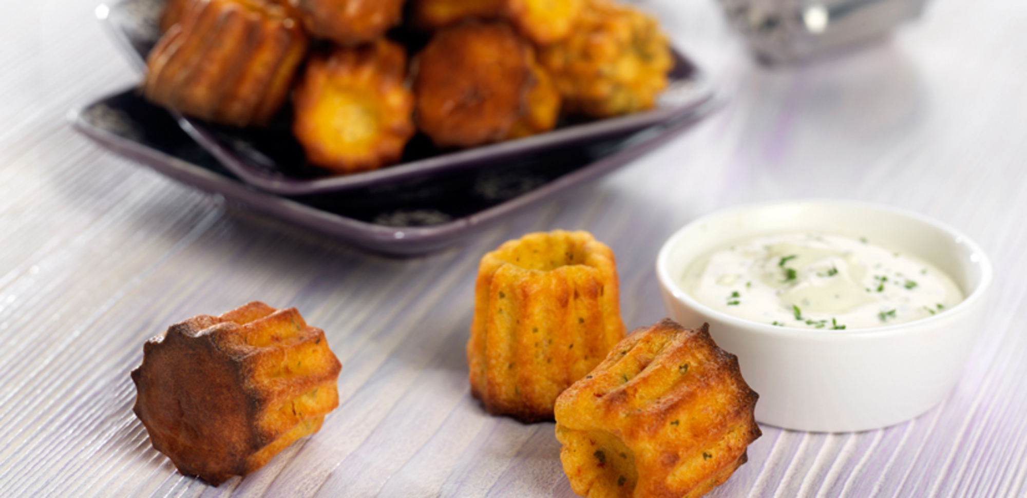 Cannelés au fromage frais et tomates confites