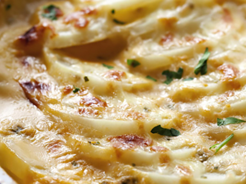 Gratin de pommes de terre au fromage à raclette