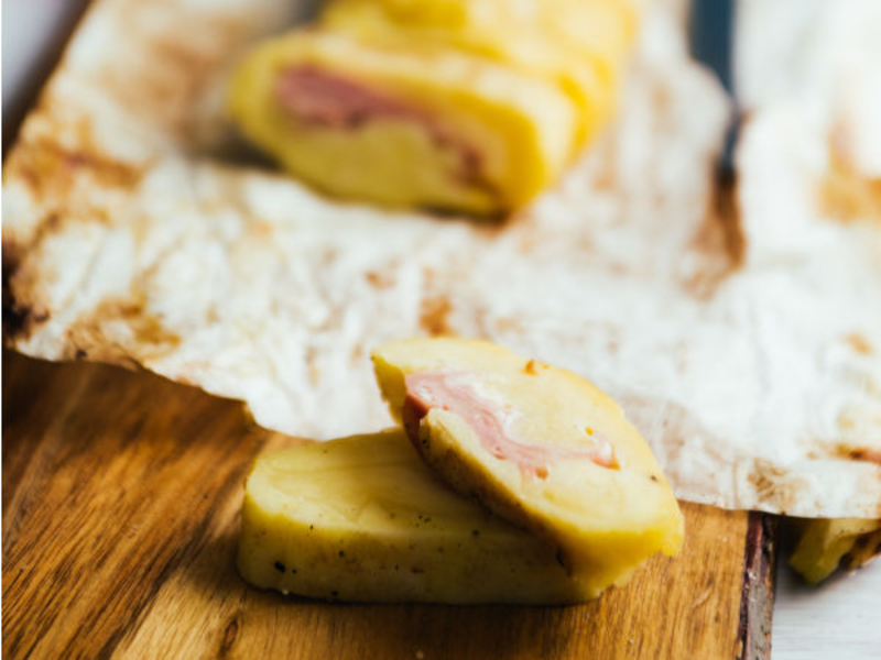 Roulé de pomme de terre et fromage à raclette