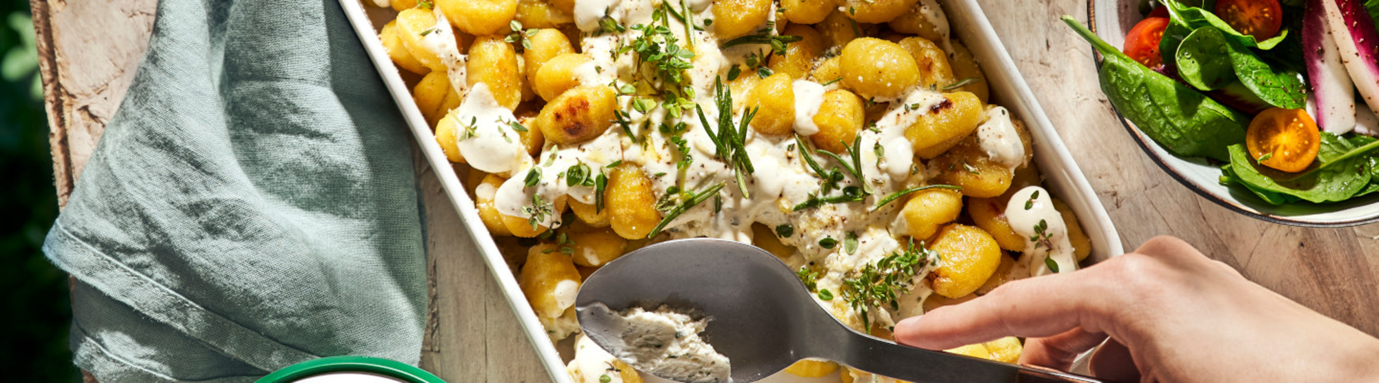 Gratin de gnocchis au fromage ail et fines herbes