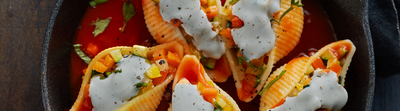 Conchiglionis farcis aux petits légumes et à la sauce au bleu