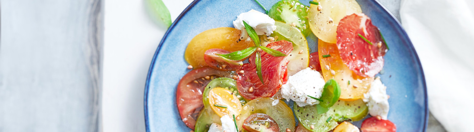 Carpaccio de tomates et lomo Iberico au fromage de chèvre