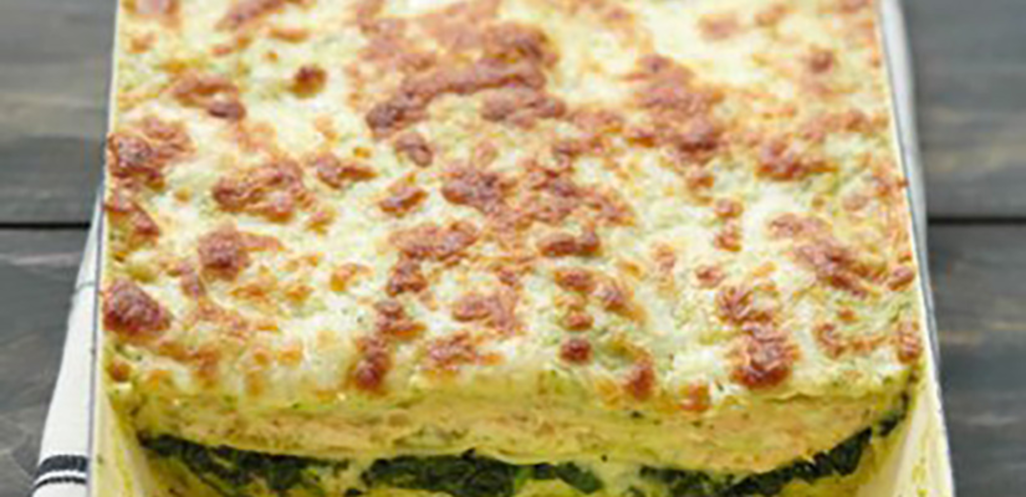 Lasagnes au saumon, pesto d'épinard et fromage italien